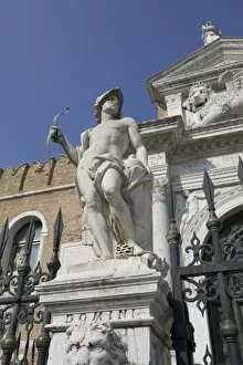 Italy, Venice. Statue in front of the Arsenal shipyard and naval depot