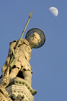 Images Dated 22nd August 2008: Italy, Venice. Statue and Moon- Basilica di San Marco. Credit as