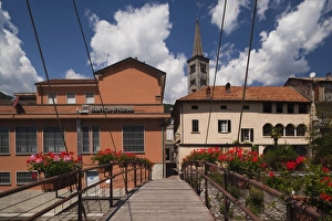 Foot Bridge Prints: Italy, Verbano-Cusio-Ossola Province, Omegna. Buildings along Torrente Nigoglia canal