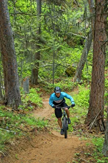 Whitefish Prints: Jared Lynch mountain biking the north end of the Whitefish Trail near Whitefish, Montana