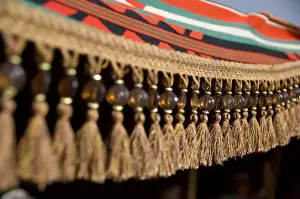 Images Dated 5th May 2009: Jordan, Wadi Rum. Traditional Bedouin tent cover with beaded tassels
