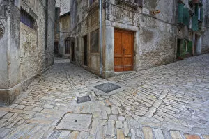 Juncture of two cobblestone streets forming a fork in the road, Rovigno, Croatia