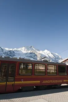 Images Dated 22nd June 2010: Jungfrau Region, Switzerland. Jungfrau massif and Jungfraujoch train in Kleine Scheidegg