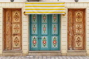 Multicolored Prints: Kairouan, Tunisia. A colorful door on a building in the city of Kairouan