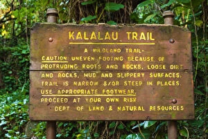 Kalalau Trail sign at the Ke e Beach trailhead, Na Pali Coast, Island of Kauai