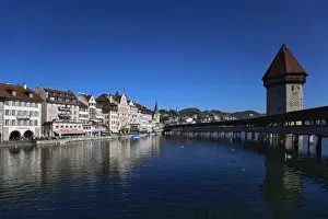 Lucerne Prints: Kapelbrucke or Chapel Bridge, spanning the Reuss River diagonally from St. Peter s
