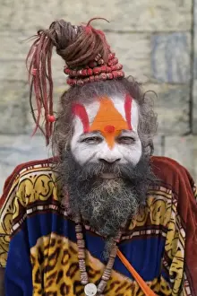 Kathmandu Nepal religious man who is a character painted in costume near river