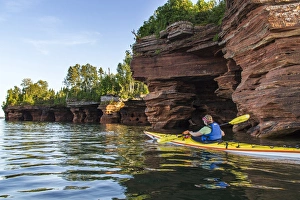 Kayak Prints: Kayaker exploring the sea caves of Devils Island in the Apostle Islands National Lakeshore