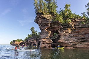Images Dated 18th September 2010: Kayakers exploring the sea caves of Devils Island in the Apostle Islands National Lakeshore