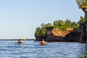 Images Dated 18th September 2010: Kayakers exploring the sea caves of Devils Island in the Apostle Islands National Lakeshore