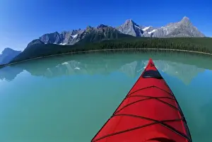 Sea Kayak Prints: Kayaking on Waterfowl Lake below Howse Peak along the Icefields Parkway in Banff National Park