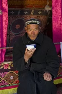 Kazakh man in his yurt (MR)