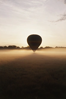 Images Dated 10th June 2014: Kenya, Masai Mara National reserve, Balloon ride at morning mist