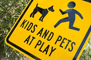 Kids and Pets at Play warning sign, Fire Island, New York, USA Kids and Pets at Play warning sign, Fire Island, New York, USA
