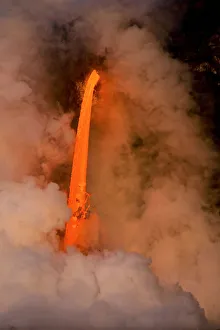 Dark Prints: Kilauea volcano, Big Island, Hawaii. A rare lava flow formation called a fire hose