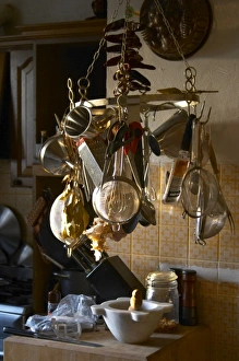 Images Dated 29th April 2006: Kitchen utensils hanging on hooks in the Provence kitchen: raper, stainer, sieves
