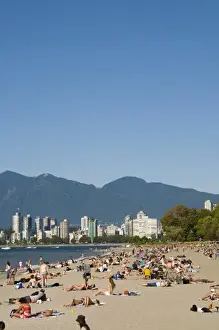 E O Reed Prints: Kitsilano Beach park and swimming pool overlook English Bay and the skyline of downtown Vancouver