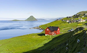 Images Dated 9th July 2016: Koltur island at sunrise, the island Vagar in the background