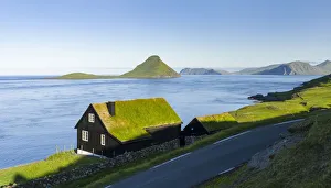 Images Dated 9th July 2016: Koltur island at sunrise, the island Vagar in the background