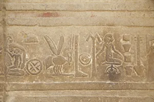 Hieroglyphic Prints: Kom Obo Temple. Aswan, Egypt. Goddess Isis shown giving birth and breast feeding