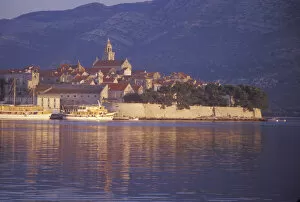 Images Dated 14th September 2007: Korcula Town from the East Harbor at sunrise. Korcula Island. Croatia