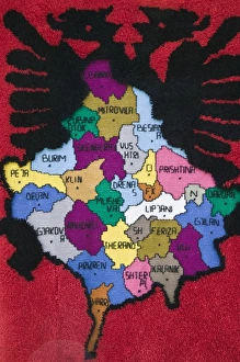 Images Dated 12th May 2007: KOSOVO, Pec. Roadside Souvenir stall selling rug with Albanian Map. Kosovo is primarily