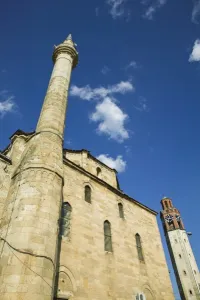 Images Dated 11th May 2007: KOSOVO, Prishtina. Exterior of the Jashar Pasha Mosque and Turkish Quarter Clock Tower
