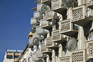 KOSOVO, Prishtina. Satellite dishes on apartment house