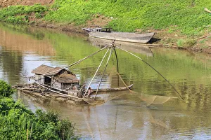 Kratie, Cambodia. Floating Vietnamese houseboat on the Mekong River in Kratie, Cambodia