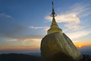 Burma Prints: Kyaiktiyo Pagoda (Gold Rock) at sunset, a small pagoda built on the top of a granite