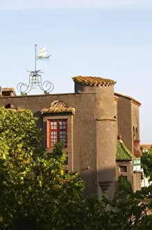 Tavern Prints: The La Galeote hotel. Weather vane in the form of a sailing ship with indication
