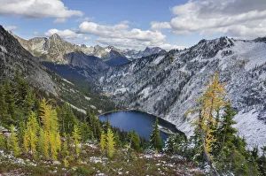 Lake Ann and golden larches after autumn snowfall. North Cascades, Washington State