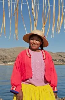Images Dated 2028: Lake Titicaca Peru with local traditional woman of Uros Tribe history in colorful