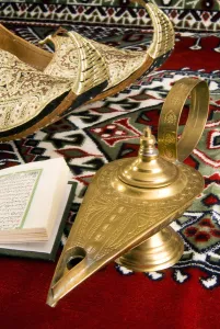 Text Prints: Lamp of Alladin, arabic shoes, holy quran on a carpet