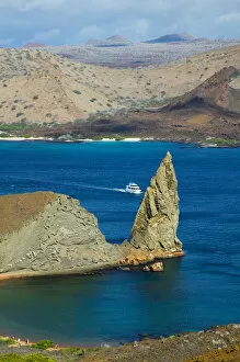 Landscape of island and yachts on ocean, Santiago, Galapagos Islands, Ecuador