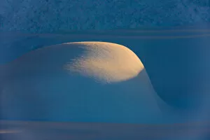 USA, North America, Alaska Gallery: Landscape of snow mound at sunset, Haines, Alaska, USA