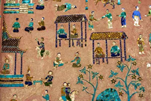 Mural Prints: Laos, Luang Prabang. Detail of mosaic decorations depicting people on the side of a