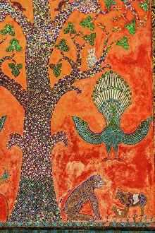Mural Prints: Laos, Luang Prabang. Mosaic depicting a tree, peacock, and other animals