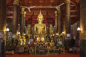 Buddhism Prints: Laos, Luang Prabang. Wat Mai Suwannaphumaham, Buddha statue