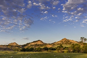 Images Dated 15th June 2016: Late day light on badlands and ranch pastures near Miles City, Montana, USA