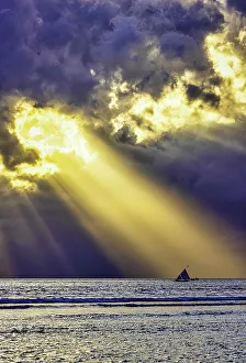 Sunray Prints: Late sunset view of Mount Agung volcano on the island of Bali