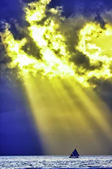 Sunray Prints: Late sunset view of Mount Agung volcano on the island of Bali