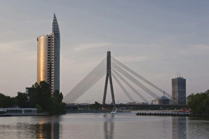 Daugava River Prints: Latvia, Riga, Vansu Bridge, Swedbank building, and Daugava River, dusk