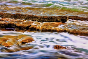 Bali Prints: Lava beach rocks worn by centuries of sea water cover the black sand beaches of Bali