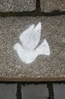 Peace Prints: LEIPZIG18941-2012-BARTRUFF. CR2 - Peace dove symbol in cobblestone sidewalk at St