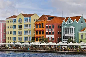 Lesser Antilles, Curacao, Willemstad. People relaxing along the waterfront