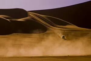 Libya, Fezzan, car among the dunes of the Erg Murzuq