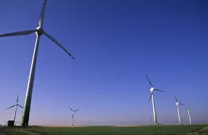 Hamburg Prints: Life in Germany ecology with wind mills capturing wind energy for electricity near