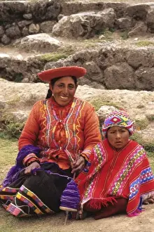 Elevation Prints: Life in Peru Cuzco in the mountains with native woman and her child in colors high elevation