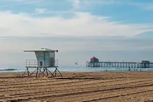 Tire Track Prints: Lifeguard shack and pier on almost deserted Huntington Beach